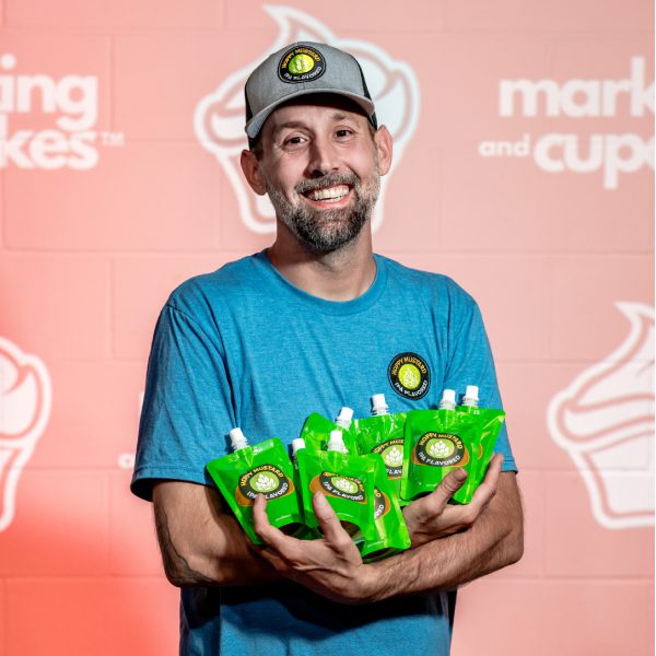 Man displaying Hoppy Mustard Products